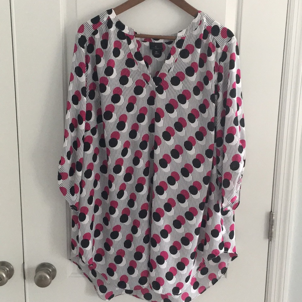 Plus size sheer blouse.